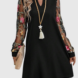 Jolanta - Elegantní šaty s výstřihem do V a výraznými rukávy