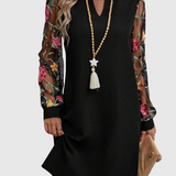 Jolanta - Elegantní šaty s výstřihem do V a výraznými rukávy